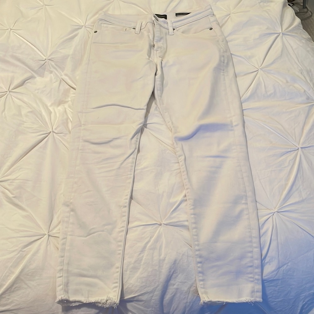 Banana Republic petite size 27. White jeans with distressed ankle.